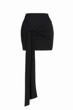 Black Microfiber Skirt with Drapped Tail in front of