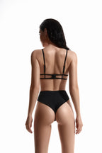 Black one-piece swimsuit with belt and mesh inserts